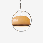 Clérachic retro dome pendant with a brown-and-white glass shade inside a circular chrome frame.