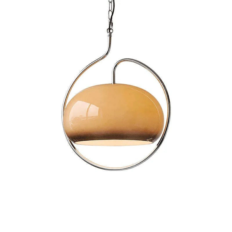 Clérachic studio shot of the brown-to-white gradient glass dome inside a chrome orbital frame.
