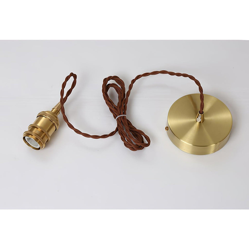 Brass socket, twisted brown cord and round ceiling plate of this Clérachic pendant, laid out flat on a pale background.