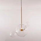 The Clérachic Bubble Cluster Pendant Light in its 4-head clear-glass cluster, product shot on a plain background.