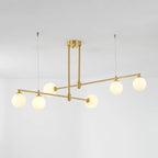 The Clérachic 6-head bubble-glass bar pendant on a plain background, its opal globes glowing warm across two staggered bars.