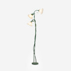Clérachic green calla-flower floor lamp in its three-bloom version, shown full length on a plain background above a round green base.