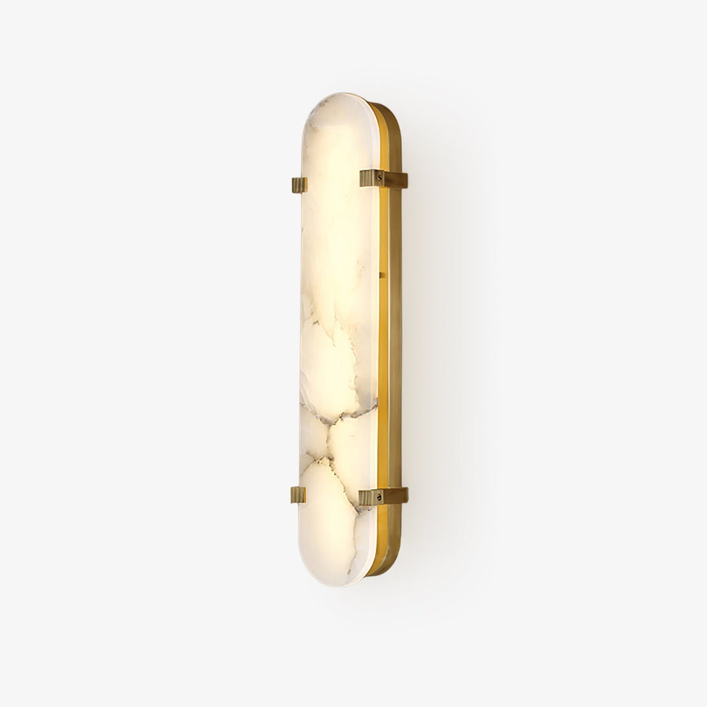 The Clérachic Calla wall light on white, unlit, showing brass hardware against pale stone.