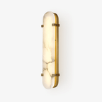 Clérachic Calla wall light on white in the larger size, natural veining clear across the stone.