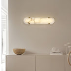 The Clérachic Calla mounted horizontally above a pale sideboard holding a wooden bowl.