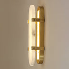 Angled view of the Clérachic Calla showing the curved brass backplate behind the stone.