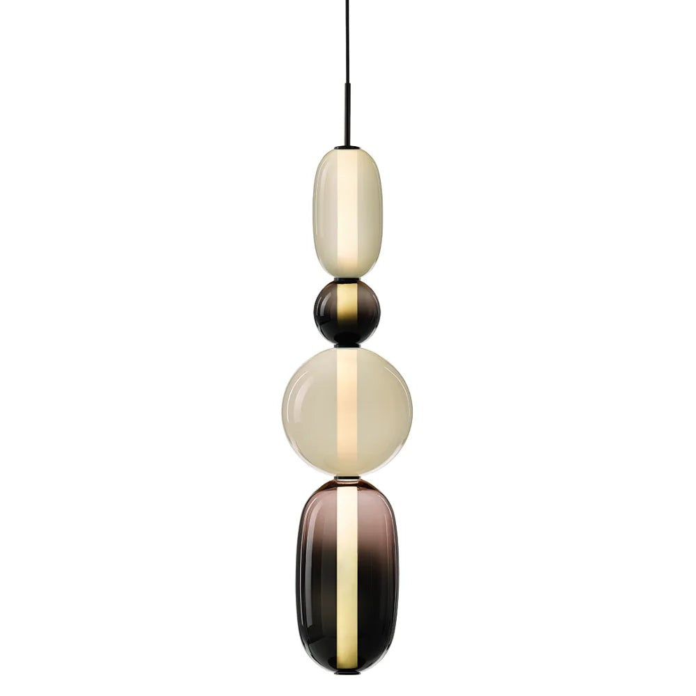 Clérachic pendant on a white background, an opal capsule, black ball, opal globe and smoked capsule on one black cord.