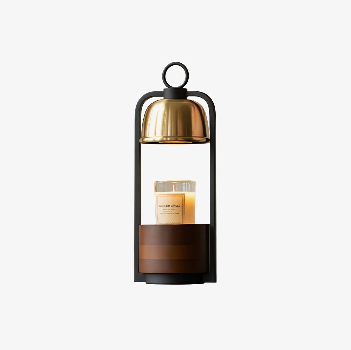 Clérachic candle warmer lamp with a gold dome and black loop handle above a walnut base, shown on a light backdrop.