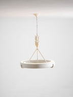 Grey studio view of the white ring from a slightly higher angle, with its chain and leaf-bud stem; a Clérachic chandelier.