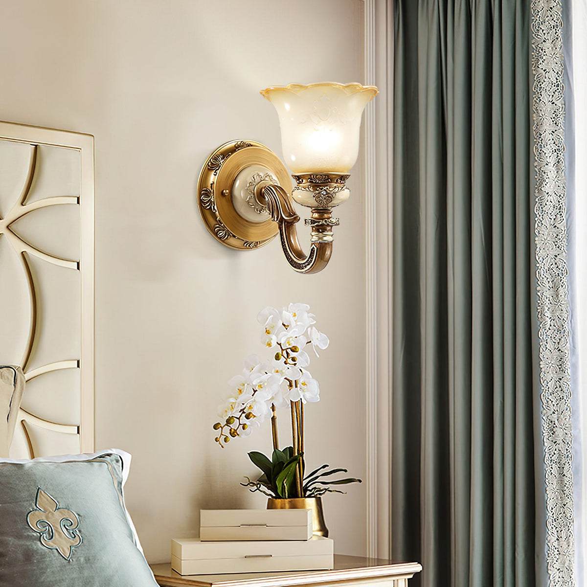 Single-head Clérachic wall light on a cream wall above a white orchid, with sage-green curtains at the right.
