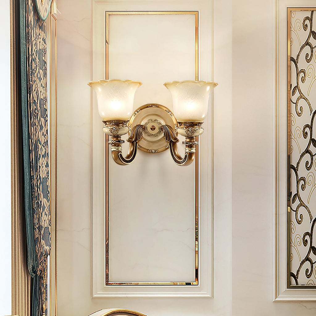 Double-head Clérachic wall light on a tall moulded wall panel, with a scrolled grille and teal drapes at either side.