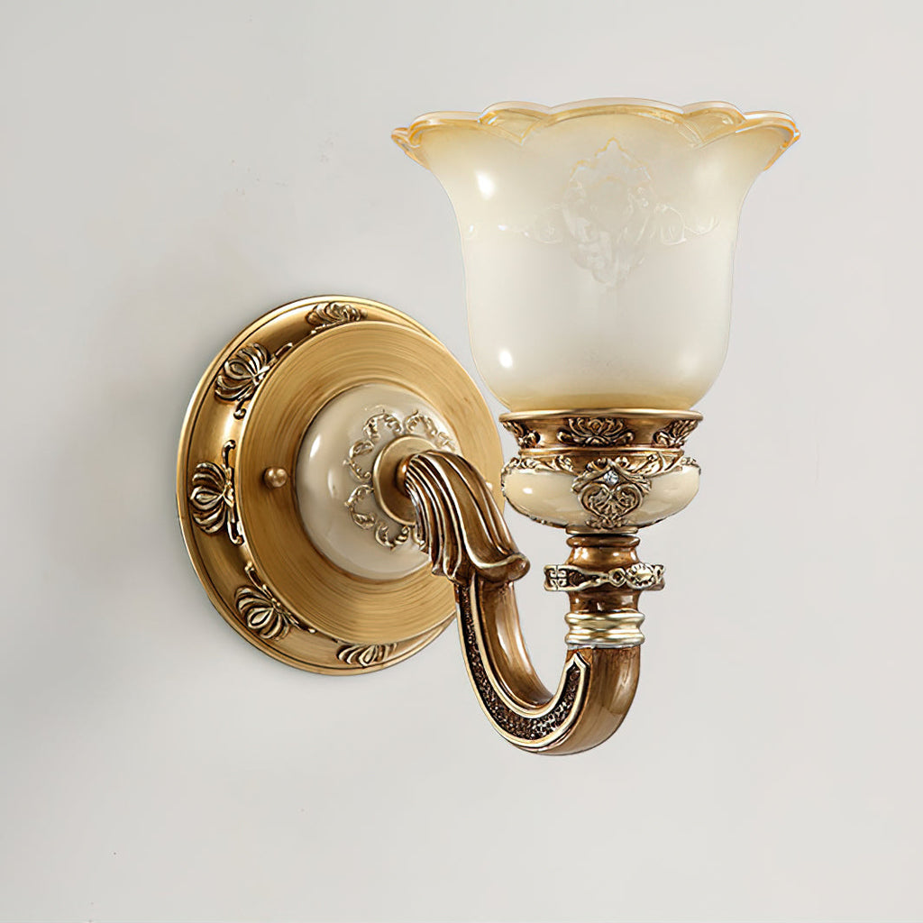 Single-head Clérachic wall light on a soft grey backdrop, its glass shade and gold-bronze arm seen from a slight angle.
