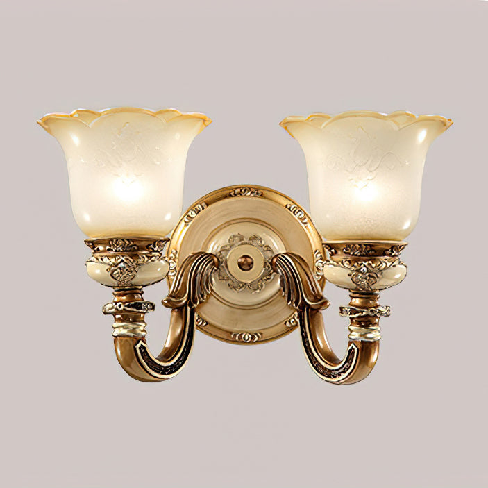 Double-head Clérachic wall light on a muted mauve-grey backdrop, both glass shades lit above gold-toned arms.