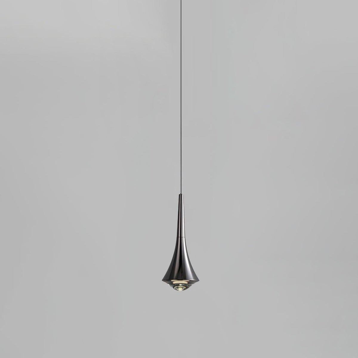 Front view of a dark chrome Clérachic pendant with a flared body and a thin black cord, on a light grey backdrop.