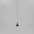 A Clérachic pendant with a flared dark chrome body and a pale champagne neck, on a thin cord against light grey.