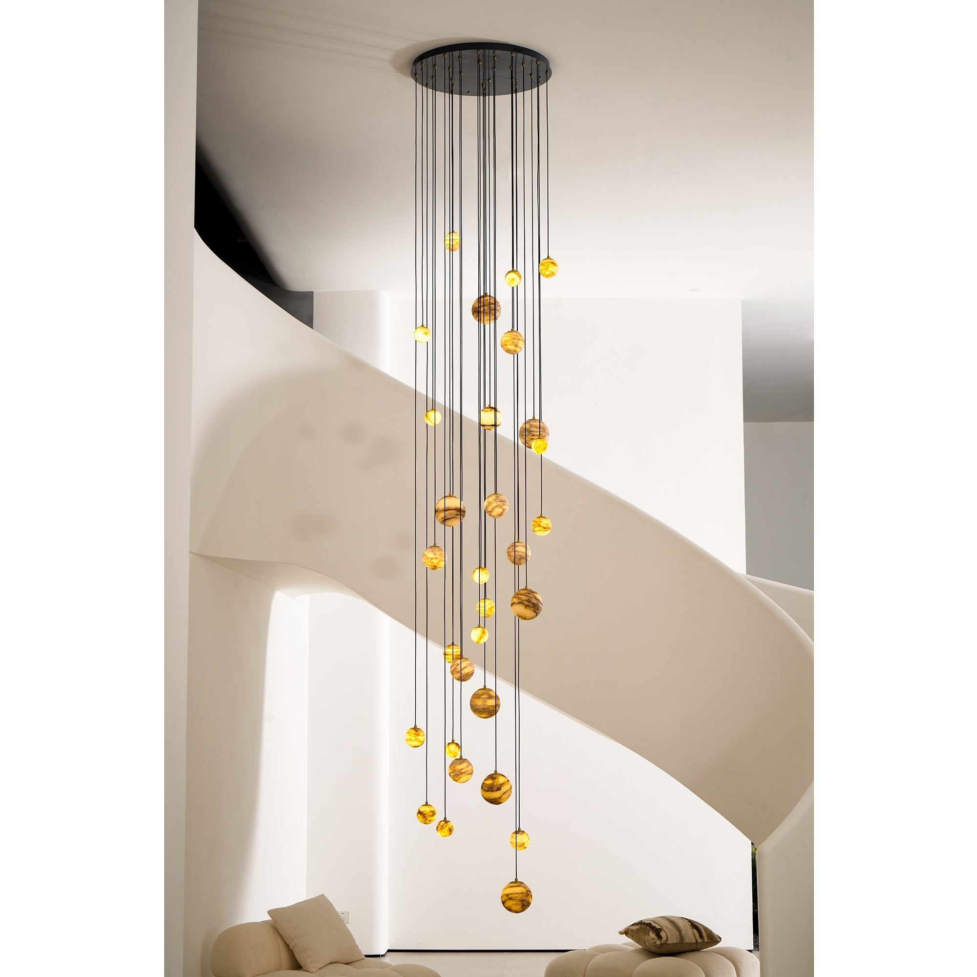 Mixed sphere diameters in the Clérachic Cascading Globe Chandelier, larger stones set among smaller ones to give the cascade its depth.