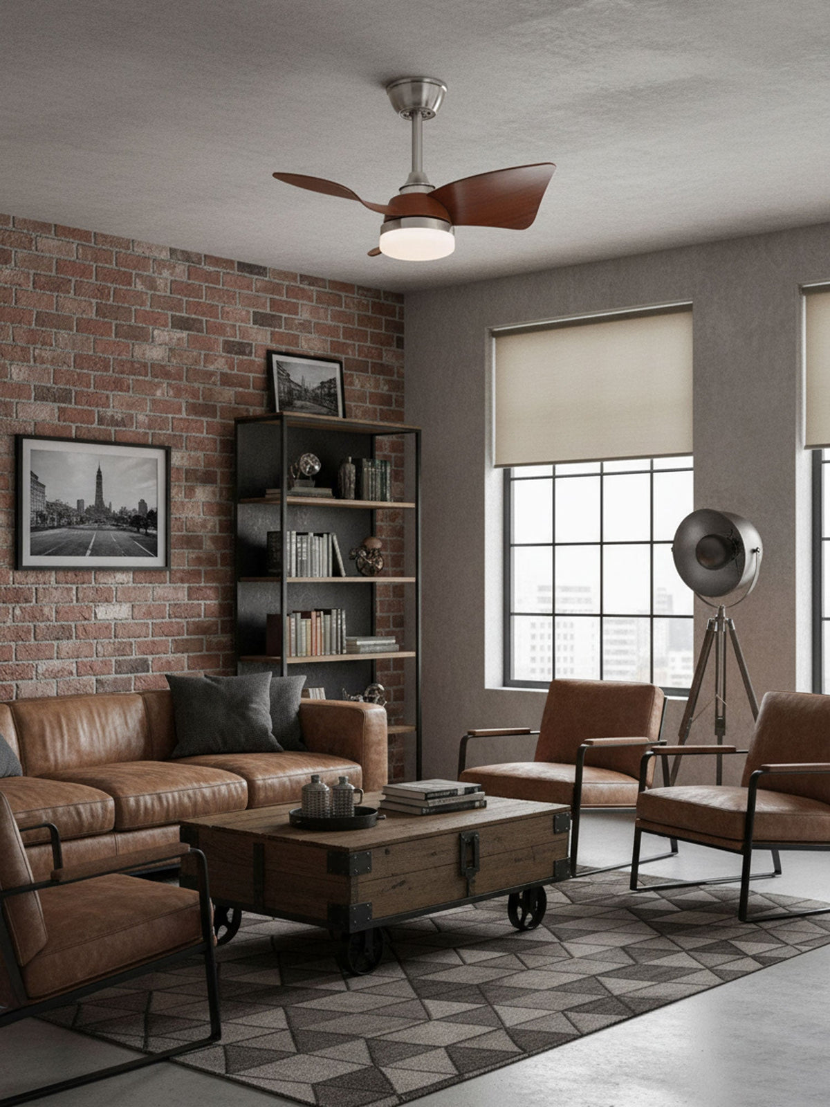 Looking up at this Clérachic fan from a brick-walled living room with black shelving, a tripod lamp and a leather sofa.
