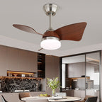 This Clérachic fan, with walnut blades and a brushed-metal stem, hangs over a dining table in a kitchen with marble splashback.