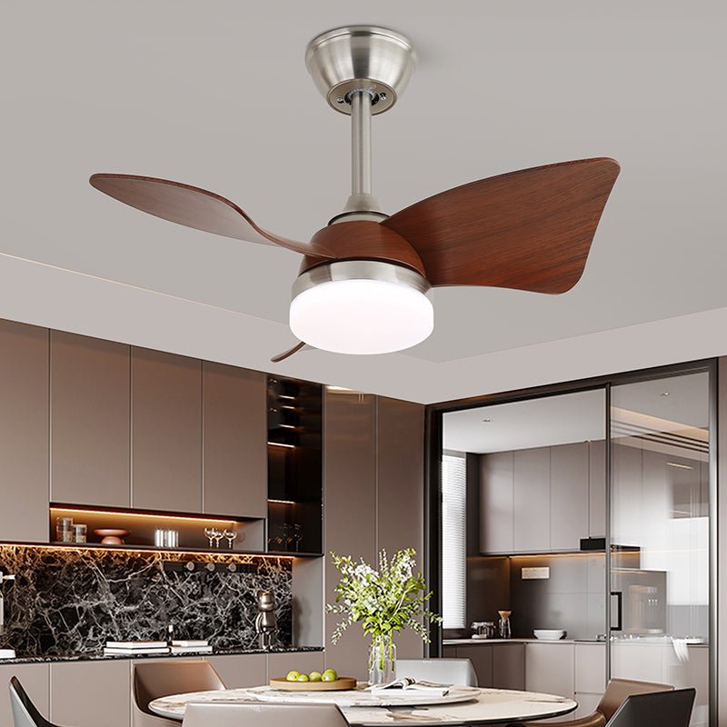 This Clérachic fan, with walnut blades and a brushed-metal stem, hangs over a dining table in a kitchen with marble splashback.