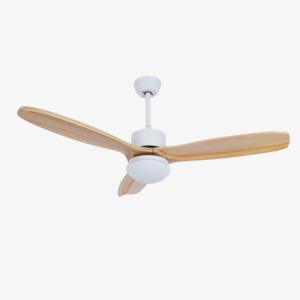 Ceiling fan with light from Clérachic, with a white motor housing, slim downrod and three light wooden blades, on white.