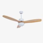 Ceiling fan with light from Clérachic, with a white motor housing, slim downrod and three light wooden blades, on white.