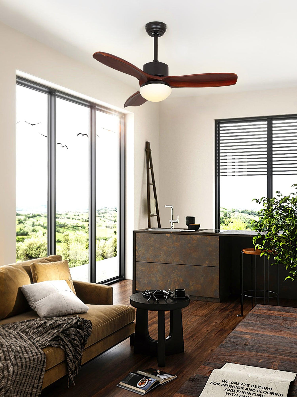 Dark brown ceiling fan with light from Clérachic in a living room with floor-to-ceiling windows and a mustard sofa.