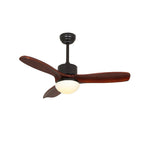Black and dark brown ceiling fan from Clérachic with three dark wooden blades and a lit round shade, on a white backdrop.