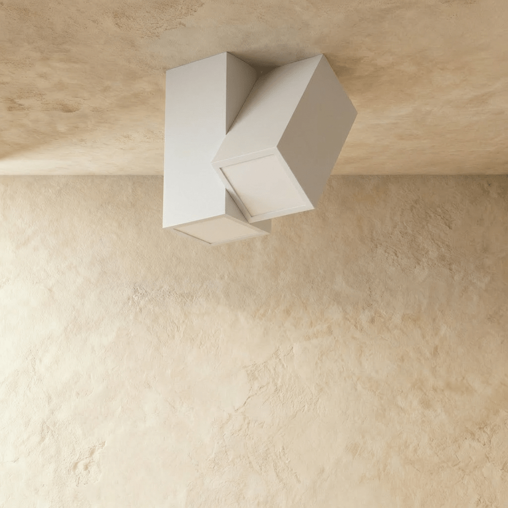 Clérachic white square-section ceiling light with two angled heads, shown switched off against a limewashed ceiling