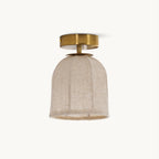 A Clérachic linen-shade ceiling light with a gold canopy, switched off, on a plain off-white backdrop.