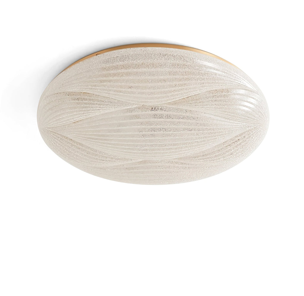 Unlit, this Clérachic ceiling light shows a gold rim and a frosted, crystal-like shade with wavy ribs, on white.