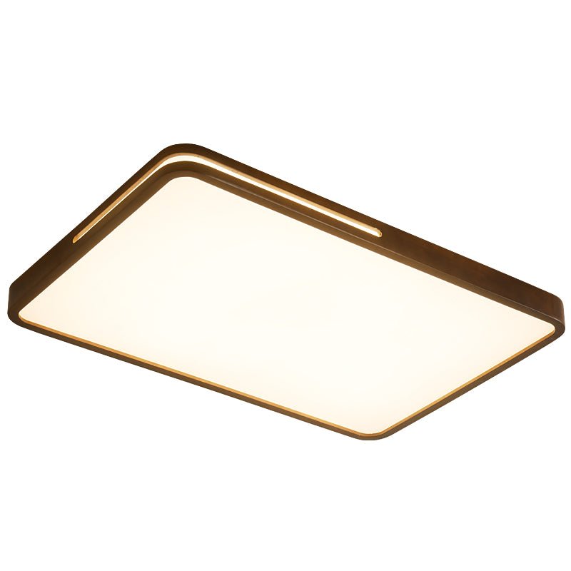 Rectangular walnut-frame ceiling light from Clérachic on white, angled to show the frosted panel and the slot in the rim.
