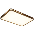 Rectangular walnut-frame ceiling light from Clérachic on white, angled to show the frosted panel and the slot in the rim.