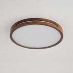 Round walnut-frame Clérachic ceiling light switched off, showing the matt white frosted panel inside the wood ring.