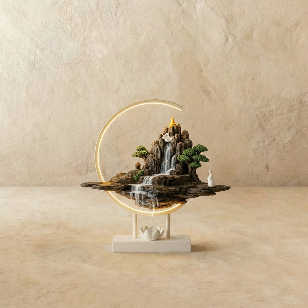 Clérachic Hills-finish ceramic incense burner lamp, a bronze mountain waterfall scene glowing inside a warm circular LED ring.
