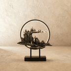Clérachic Cloudy Hills incense burner lamp, a grey stone peak with a tiny pavilion and drifting cloud set inside a black ring.