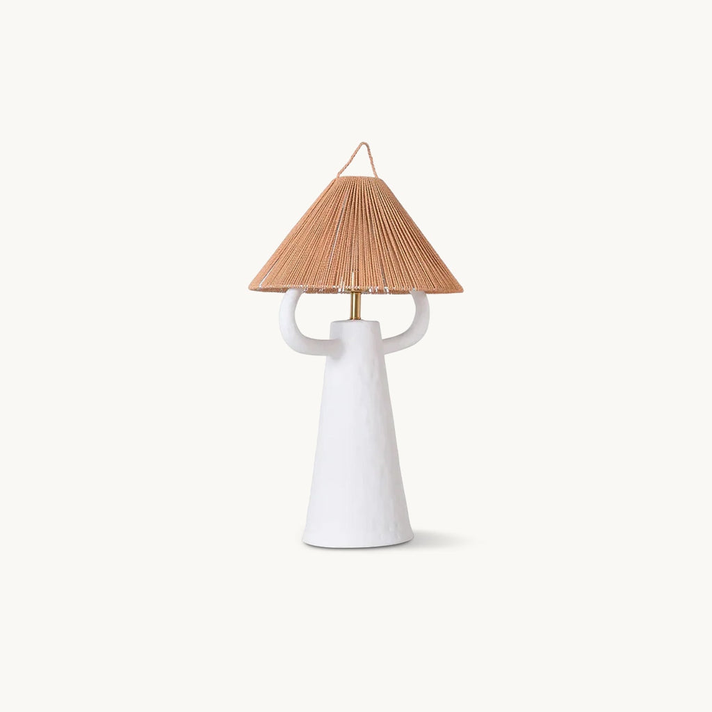Clérachic ceramic table lamp with a white hand-pressed body, two curved arms and a woven rope cone shade, on a plain white backdrop.