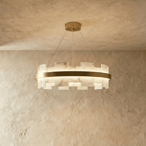 Clérachic circular chandelier with staggered alabaster panels around a brushed brass ring, lit on three fine cables.