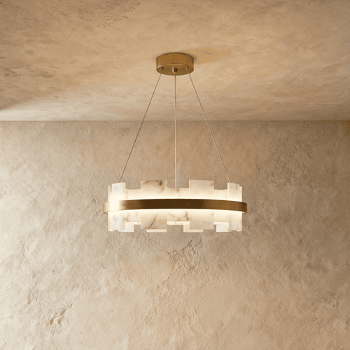 Clérachic smaller circular chandelier, staggered veined alabaster segments around a brushed brass ring, lit.