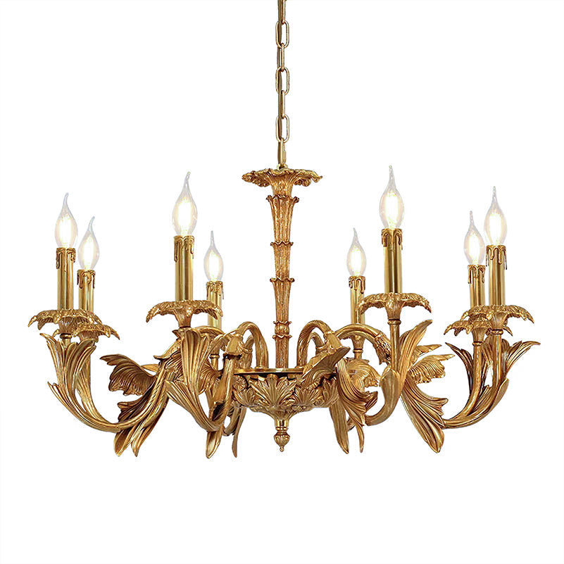 Clérachic brass chandelier on a white background, hanging from a fine chain with lit flame-tip bulbs above its leafy arms.