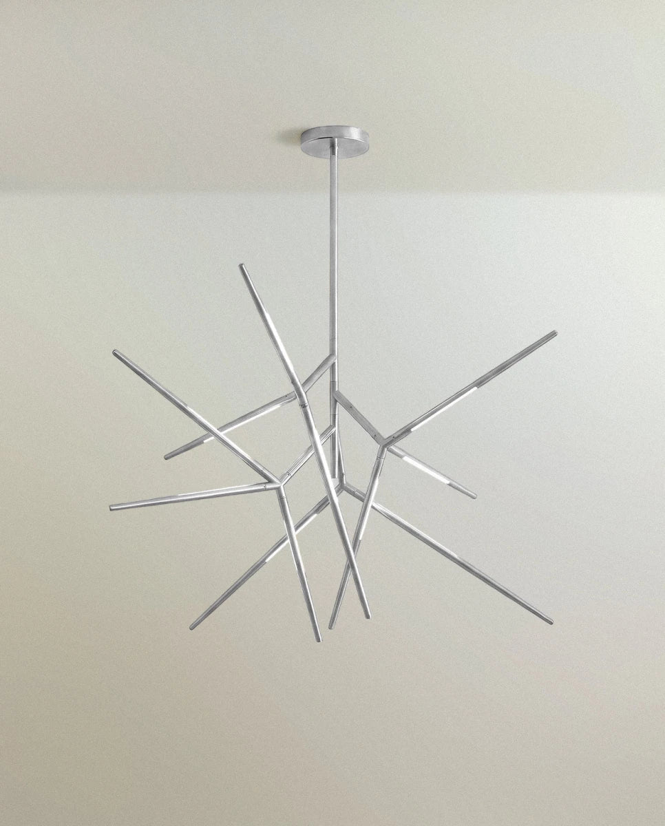 Clérachic branching rod chandelier in polished chrome, angular arms spreading from a slim stem and canopy.