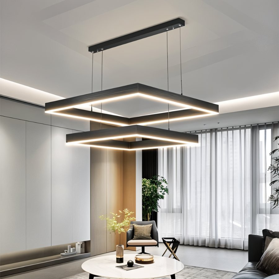 Clérachic two-tier square LED chandelier in black over a bright living room, its glowing edges stacked one below the other.