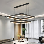 Clérachic two-tier square LED chandelier in black over a bright living room, its glowing edges stacked one below the other.