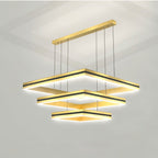 Clérachic three-tier gold square LED chandelier with black bands, hung from a long gold ceiling bar on six cables.