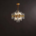 Compact Clérachic chandelier with brass bars and clear glass rods, lit, against a dark brown studio backdrop.