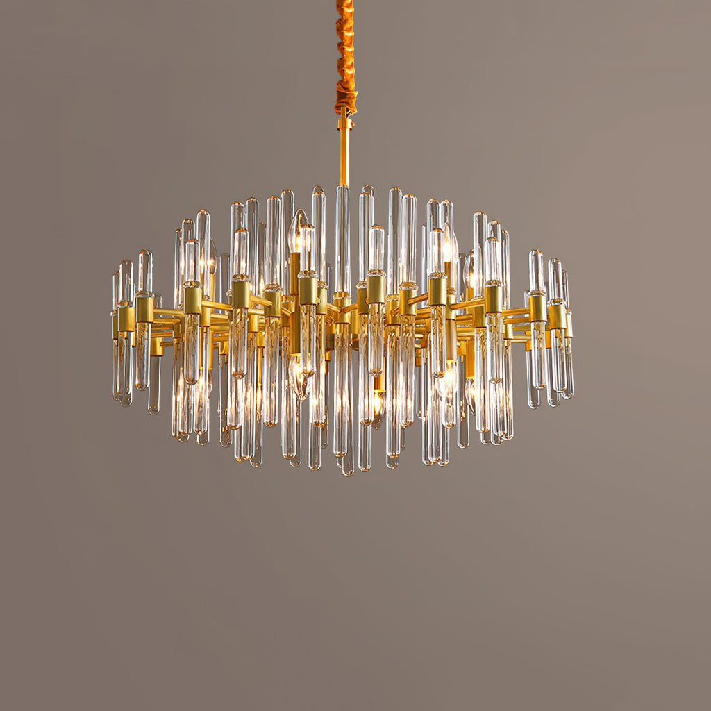 Wide view of this Clérachic chandelier on a muted brown-grey backdrop, its glass rods spread in a lit, round form.