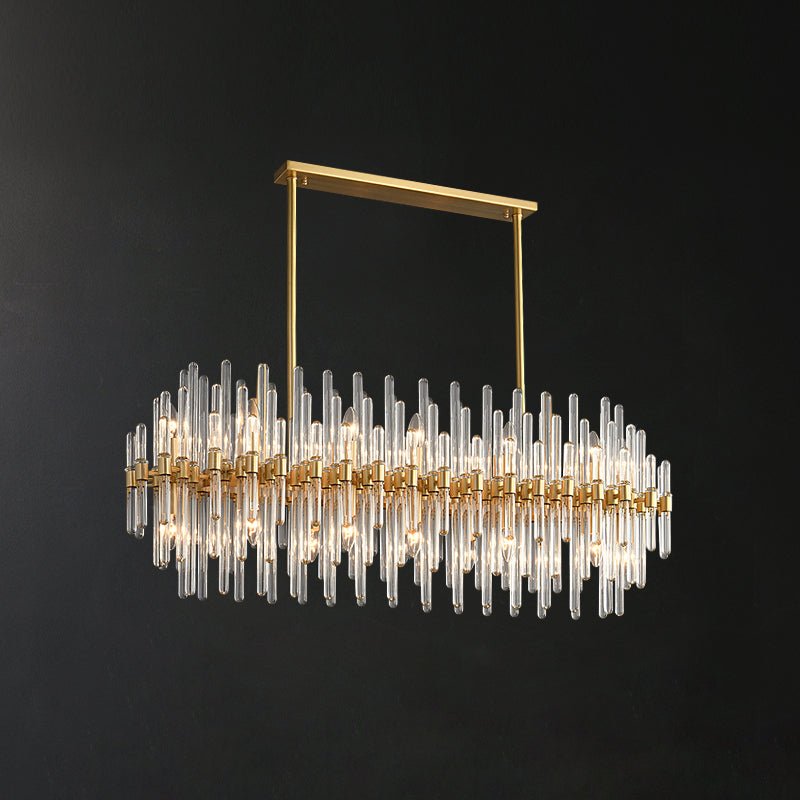 The linear-bar Clérachic chandelier lit on a dark backdrop, with its oval layout and long glass rods in staggered rows.