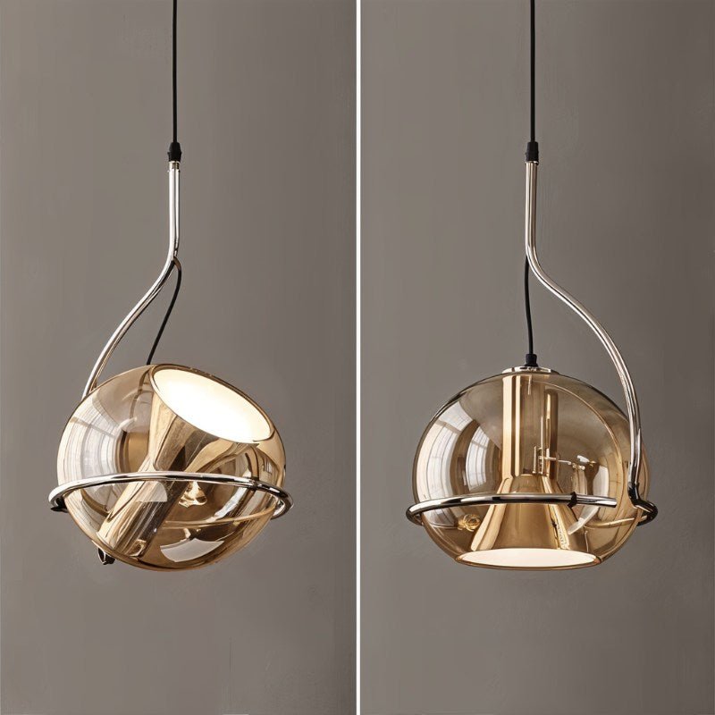 Two angles of the Clérachic champagne glass pendant light, chrome arm and ring cradling the globe shade, lit and unlit.