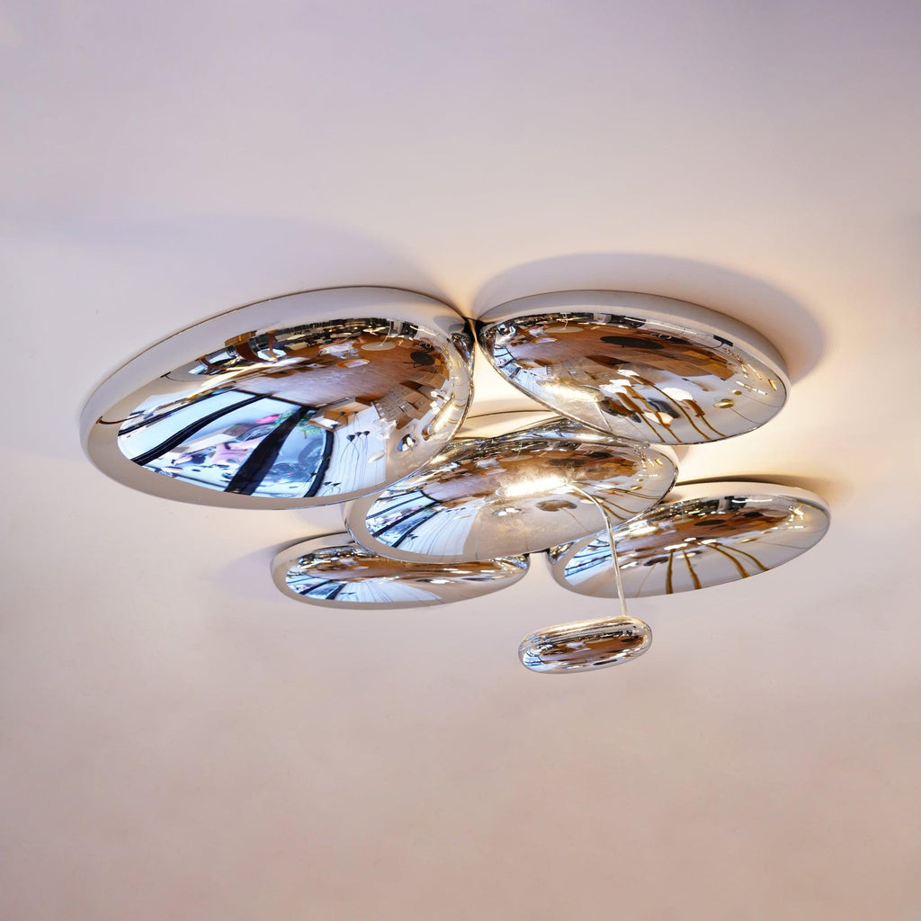 Clérachic Chrome Ceiling Light from below, six chrome pebble heads catching window light on a white ceiling.