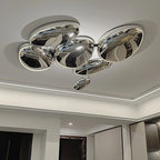 Clérachic 6-head Chrome Ceiling Light beside a recessed LED cove and dark wood cabinetry with shelf lighting.