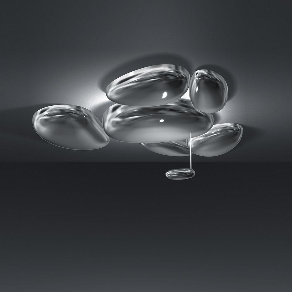 Clérachic 6-head Chrome Ceiling Light on a dark ceiling, five chrome pebbles flush and one smaller pebble hanging.